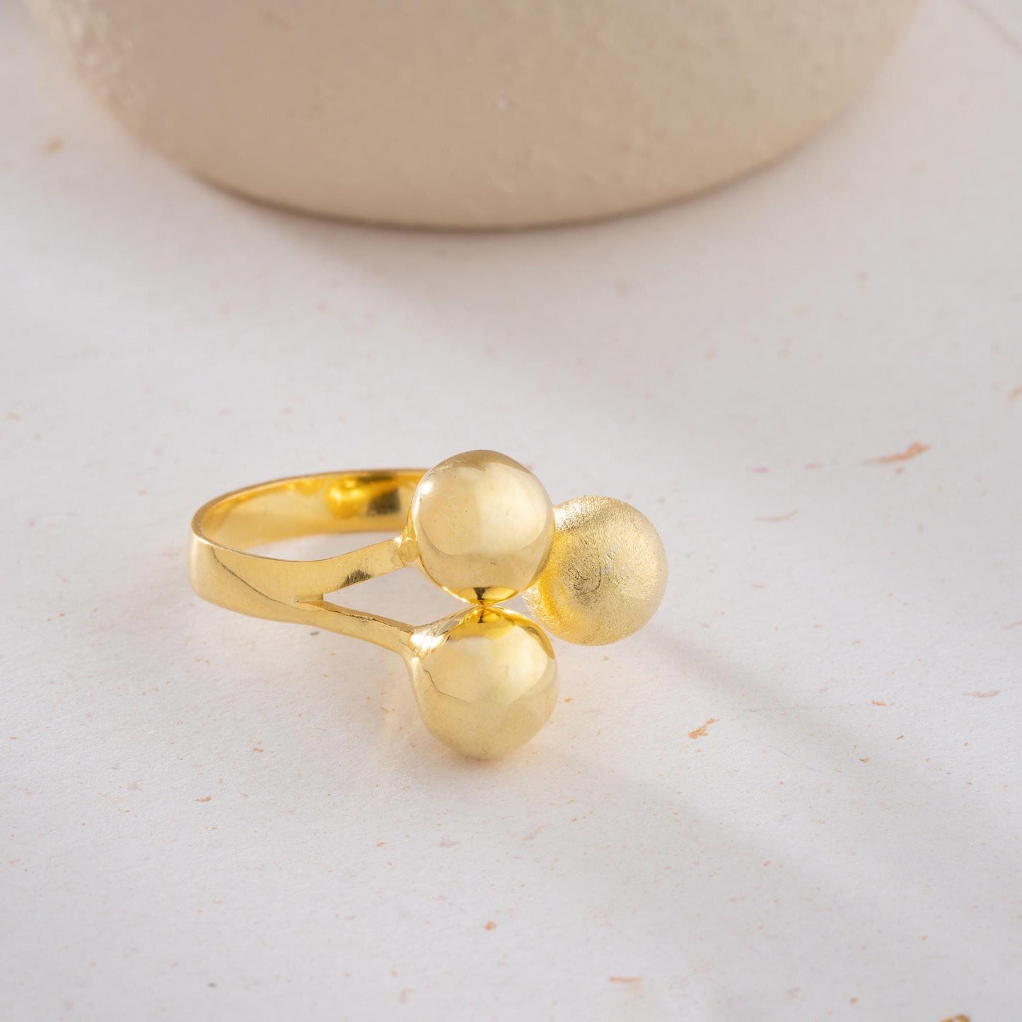 Triple ball adjustable open ring in 925 sterling silver and 14K gold plating, featuring a mix of shiny, matte, and brushed textures.