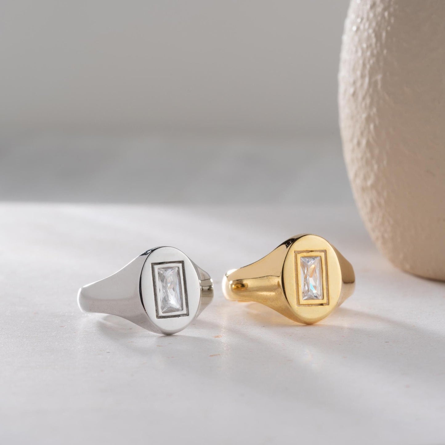 Baguette signet ring featuring a sleek baguette-cut cubic zirconia stone, crafted from 925 Sterling Silver with gold plating option, elegant for daily wear or gifting.