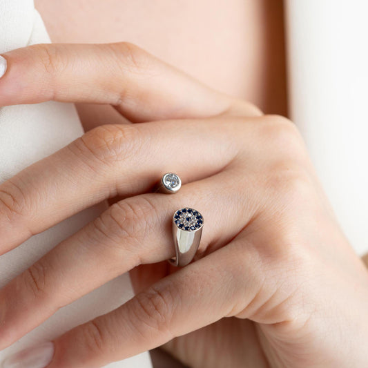Adjustable open ring featuring a round evil eye charm with cubic zirconia stones, crafted in 925 Sterling Silver and 14K Gold Plated finish.