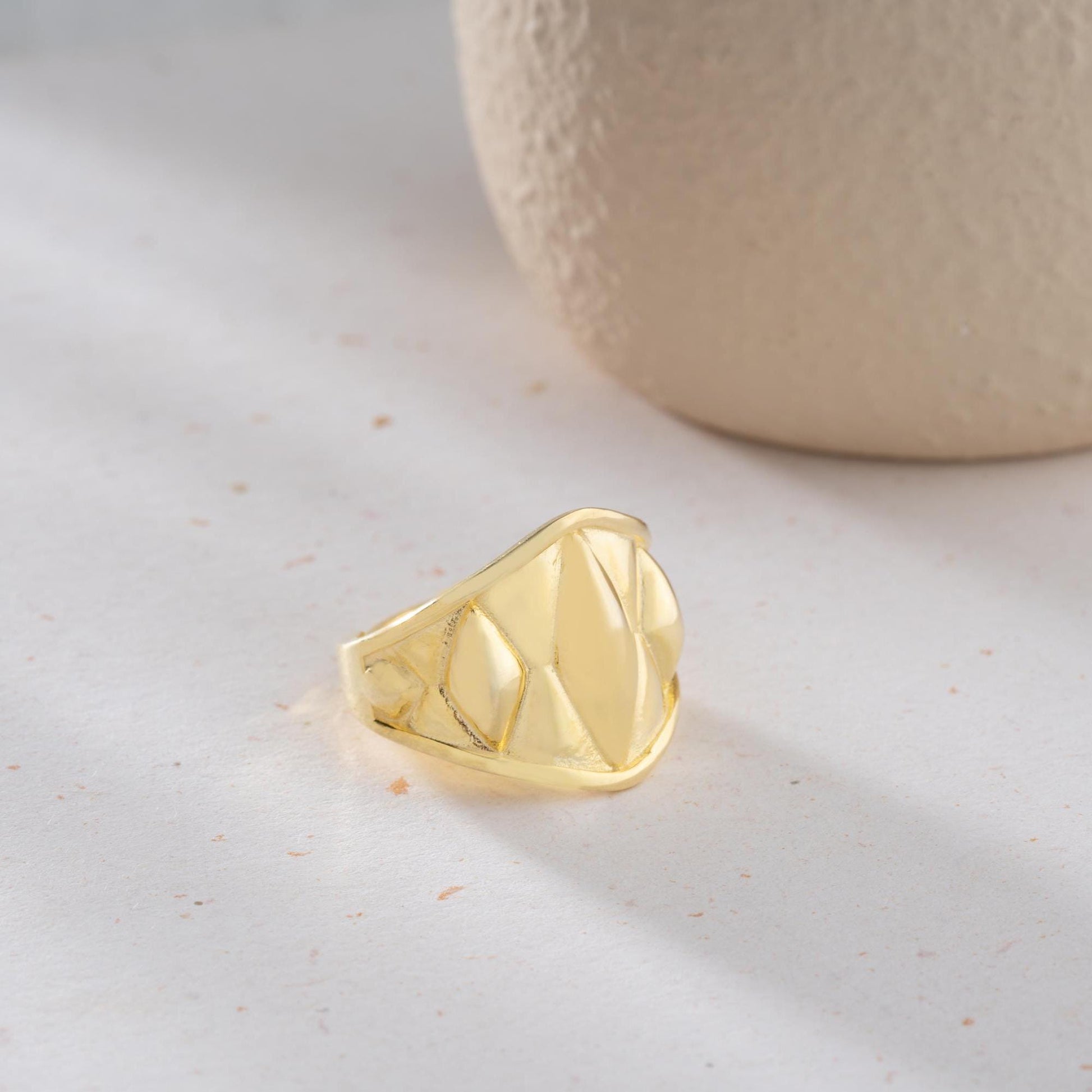 Chunky geometric signet ring with bold diamond-shaped design, crafted from 925 sterling silver and available in 14K gold plating. A modern and adjustable statement piece for men and women.