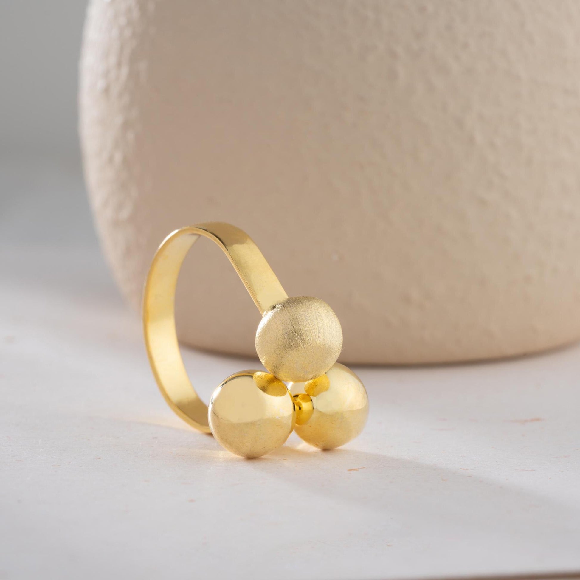 Triple ball adjustable open ring in 925 sterling silver and 14K gold plating, featuring a mix of shiny, matte, and brushed textures.