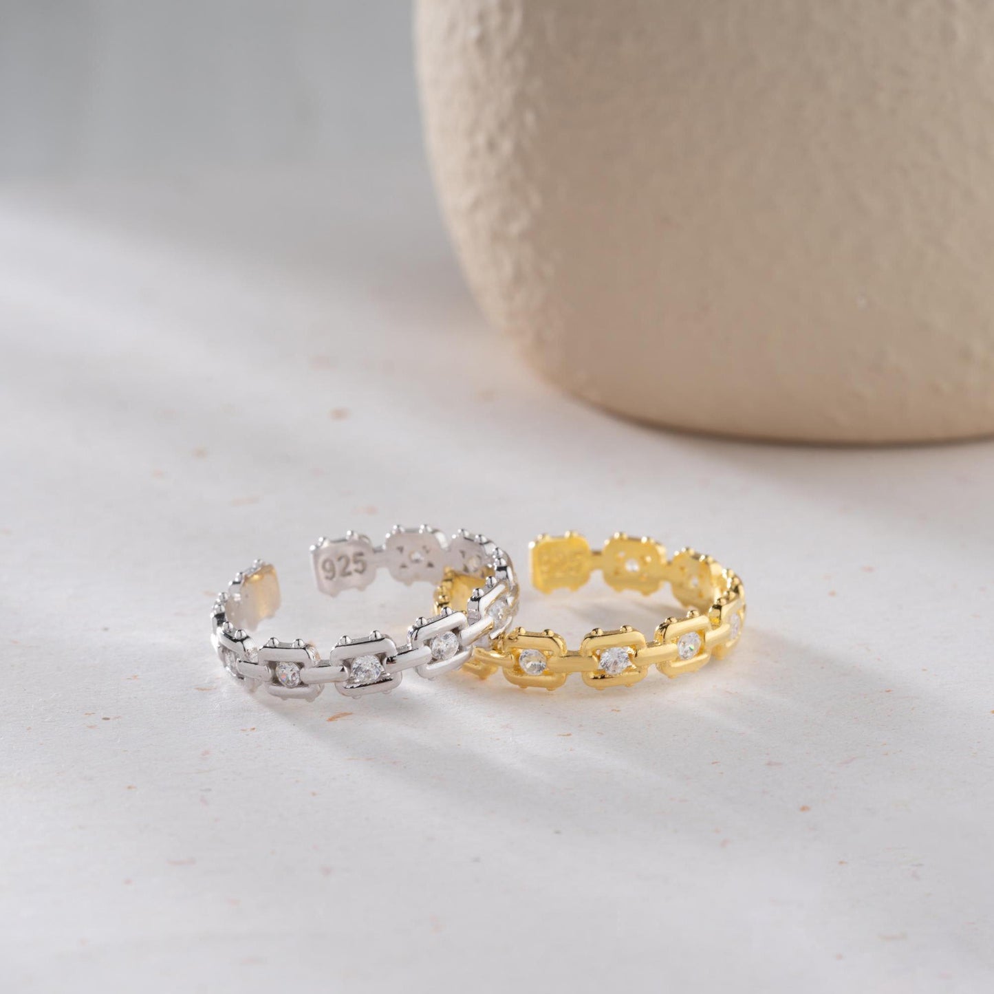 A dazzling chain link eternity ring with cubic zirconia stones, handcrafted from 925 sterling silver and available in silver or 14K gold plated finishes. Ideal for birthdays, anniversaries, and gifts for her.