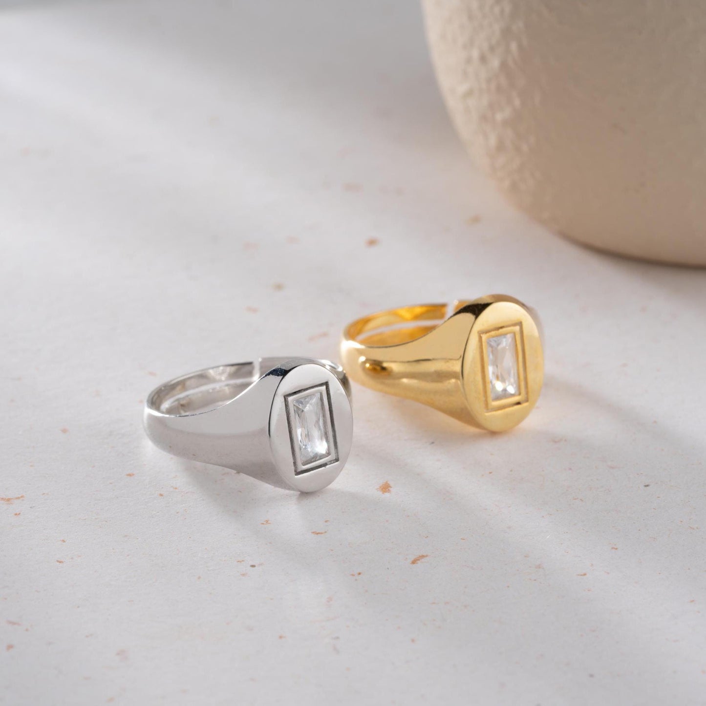 Baguette signet ring featuring a sleek baguette-cut cubic zirconia stone, crafted from 925 Sterling Silver with gold plating option, elegant for daily wear or gifting.