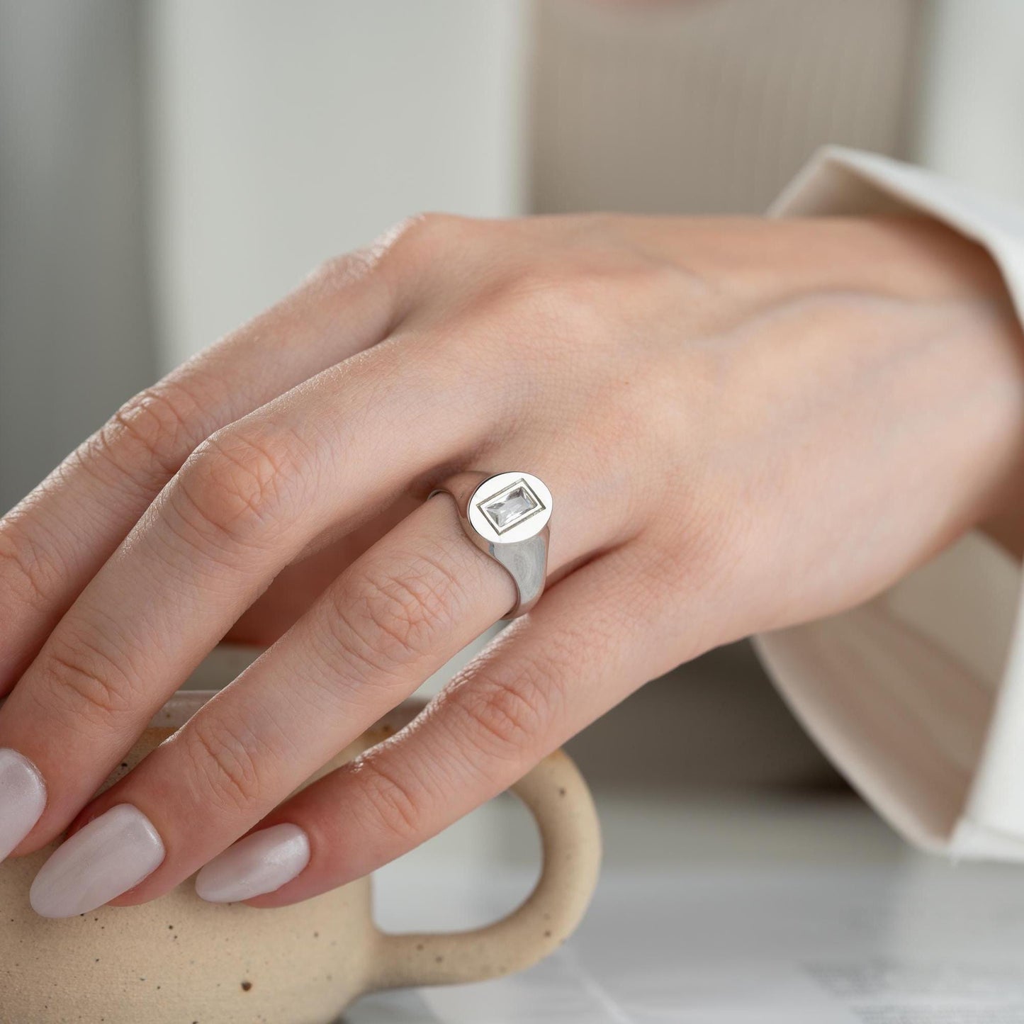 Baguette signet ring featuring a sleek baguette-cut cubic zirconia stone, crafted from 925 Sterling Silver with gold plating option, elegant for daily wear or gifting.