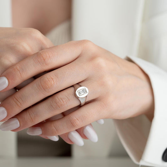 Baguette signet ring featuring a sleek baguette-cut cubic zirconia stone, crafted from 925 Sterling Silver with gold plating option, elegant for daily wear or gifting.