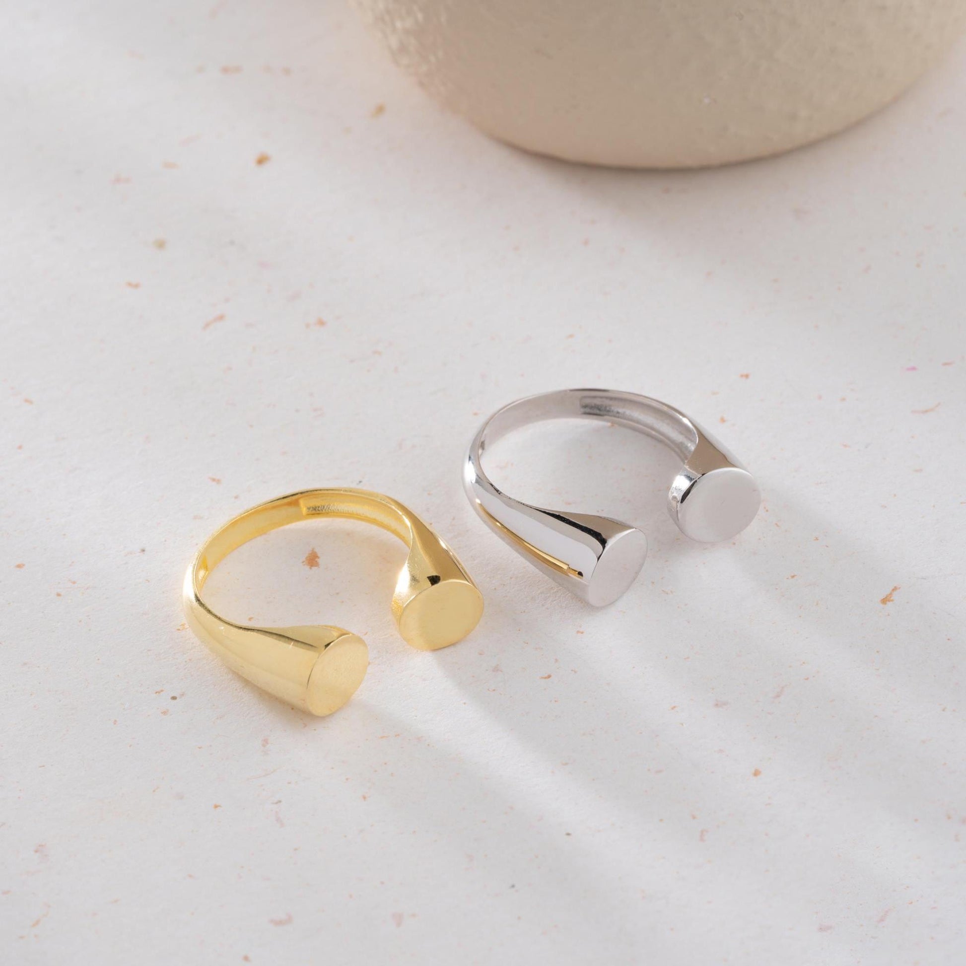 Minimalist open-band ring crafted from 925 Sterling Silver, available with a 14K Gold Plated option. A sleek and bold adjustable ring, ideal for gifting and daily wear.