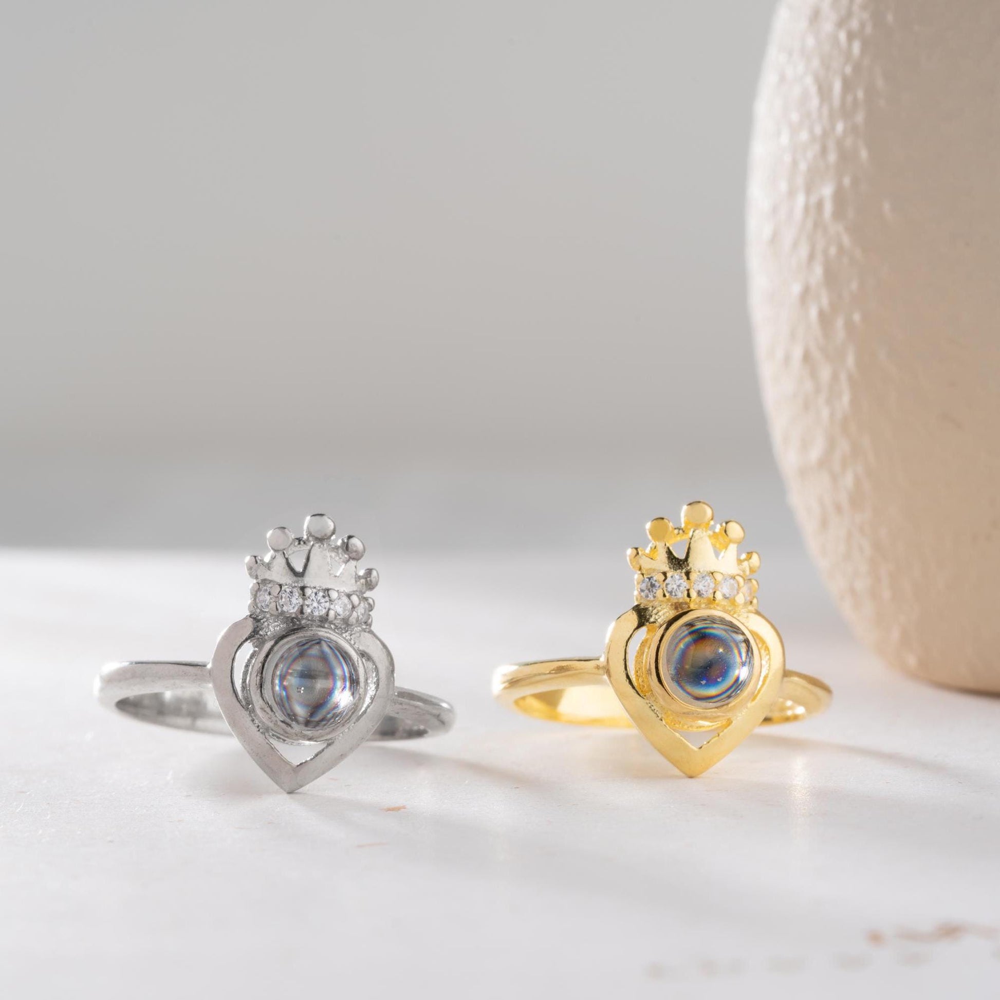 Romantic crown heart projection ring made from 925 Sterling Silver, projecting “I Love You” in 100 languages. Available in silver and gold finishes, ideal for special gifts.
