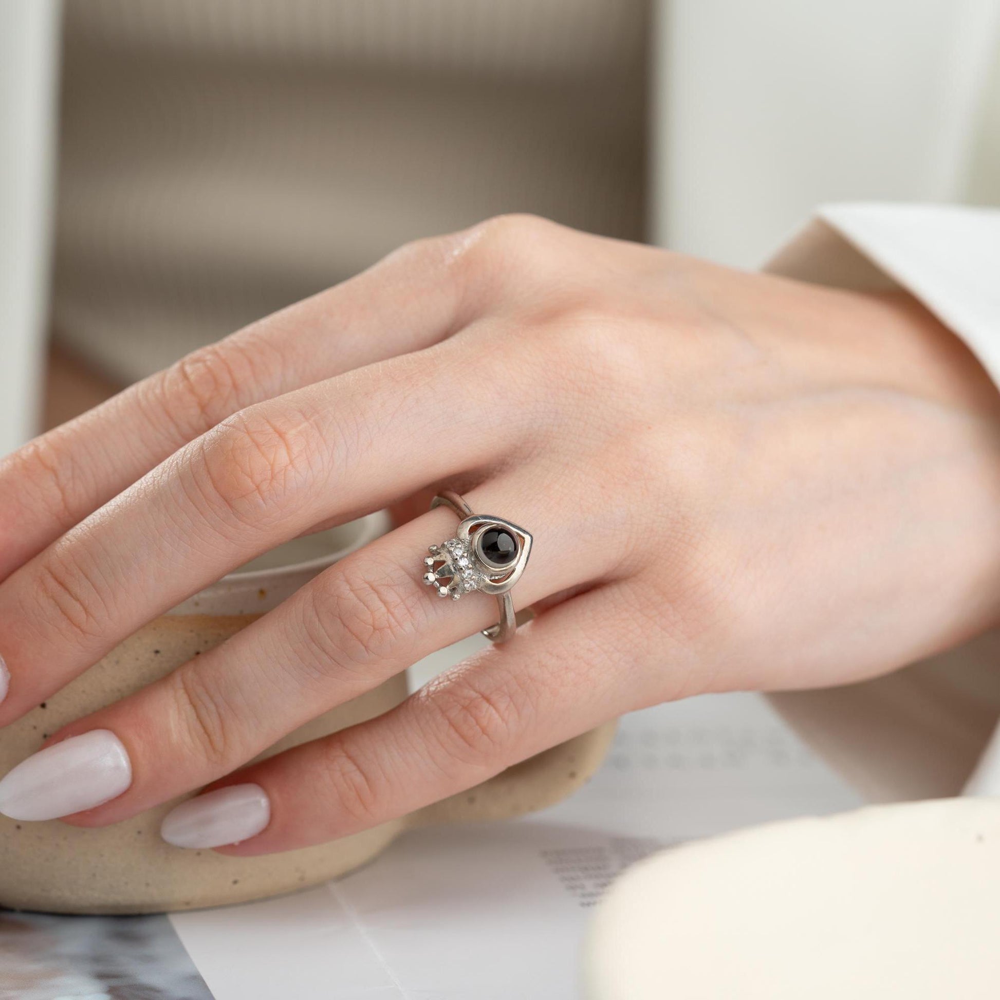 Romantic crown heart projection ring made from 925 Sterling Silver, projecting “I Love You” in 100 languages. Available in silver and gold finishes, ideal for special gifts.